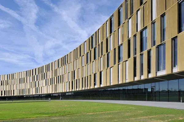 Golden sun shades in the curved façade